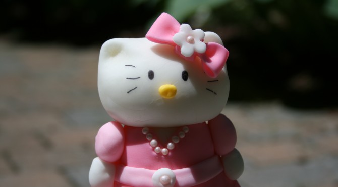 Kitty with a sugar pearl necklace.